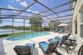 Stunning Lake View from South Facing Extended Pool Deck with Games Room on Gated Solterra Resort